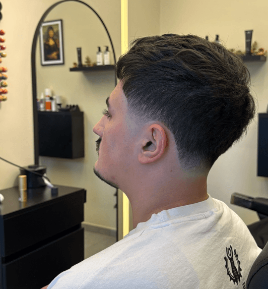 Close-up of a precise haircut and taper